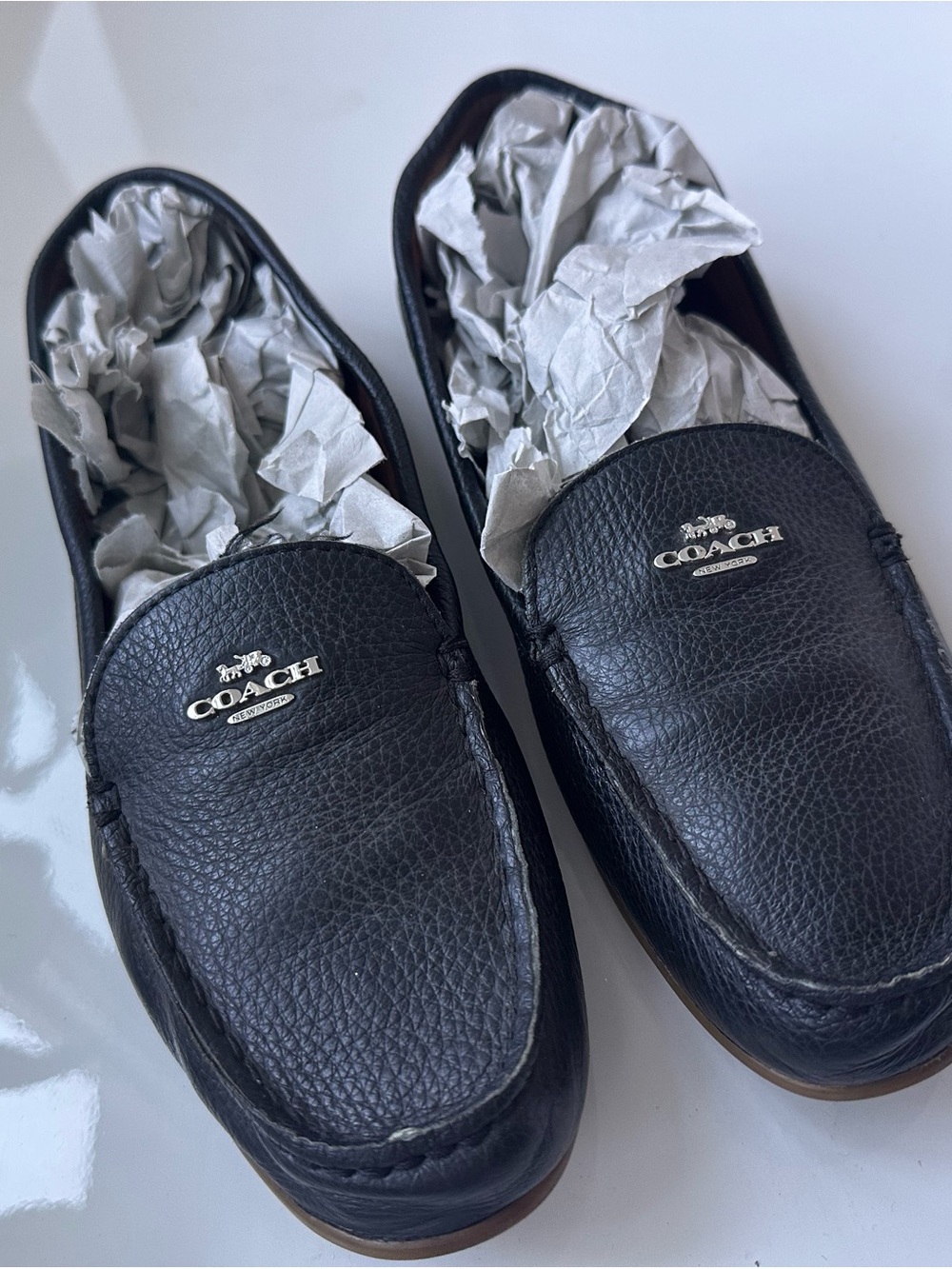 Coach Black Pebbled Leather Slip-On Loafers with Silver Logo Accent